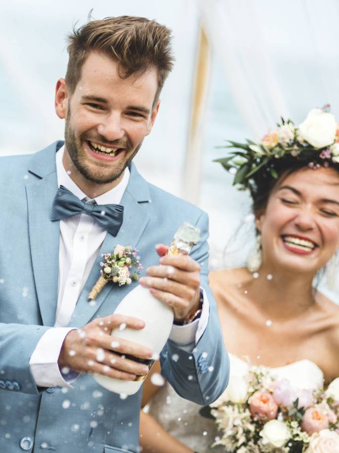 Young couple in a wedding ceremony at the beach
