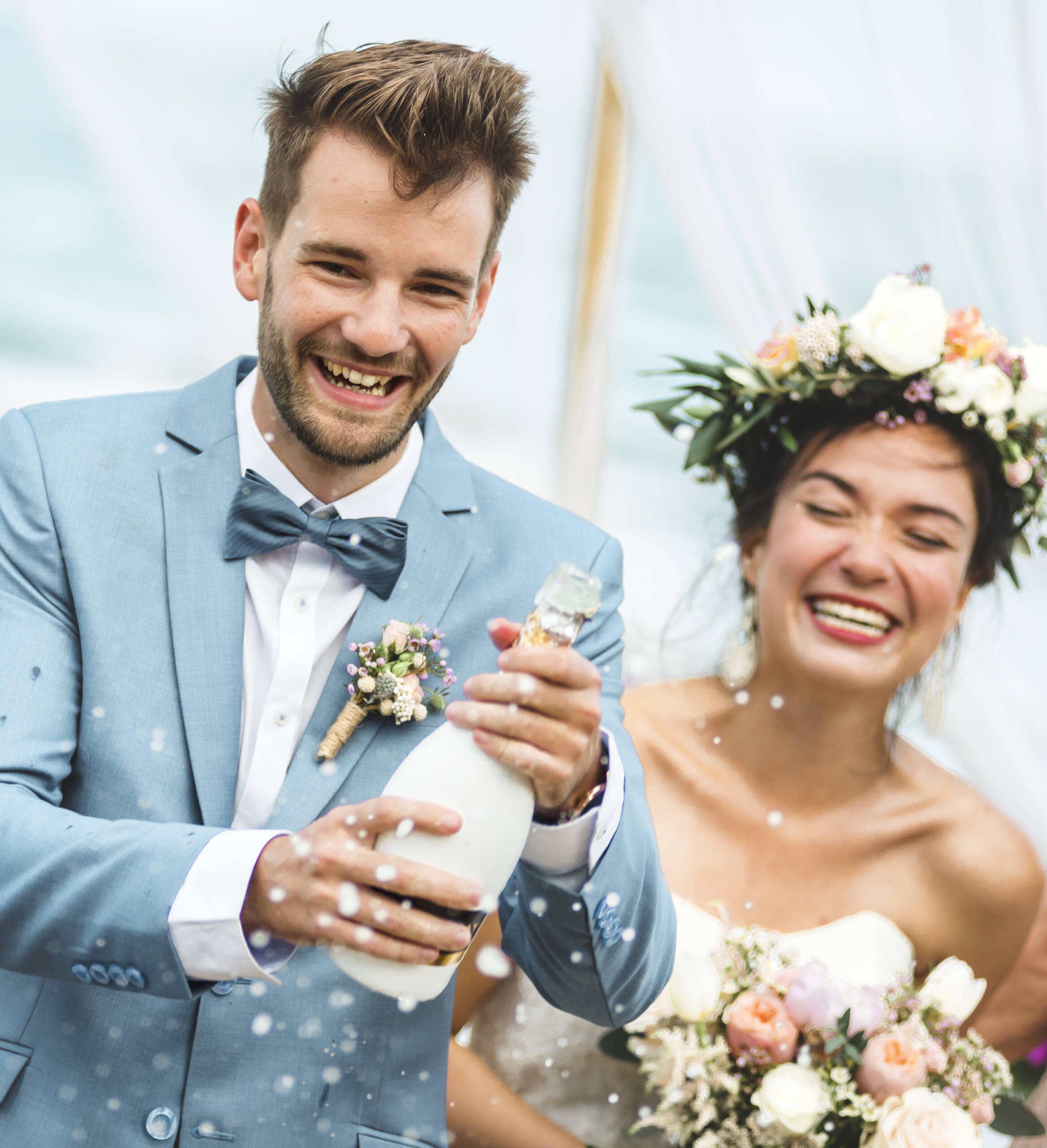 Young couple in a wedding ceremony at the beach